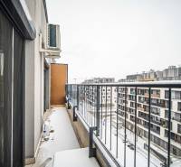 The balcony of a 2-room apartment on Zuzany Chalupovej, Bratislava - Petržalka with a snow-covered floor.