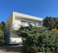 A cottage on the Sunny Lakes in Senec with a terrace and abundant greenery.