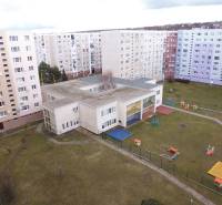 Buildings and a playground on Čergovská Street in Prešov, between the apartment buildings.