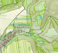 Map of agricultural and forest landscape in the Lúka mountains with various plots and roads.