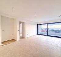 Spacious living room in a 3-room apartment with a sea view.
