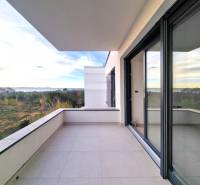 A balcony with a view of nature in a 3-room apartment, Privlaka.