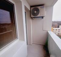 Balcony of a 3-room apartment with air conditioning and a view of Petržalka on Marie Curie Sklodowska Street.