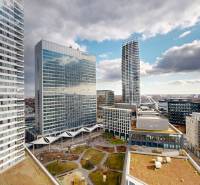 View from the apartment building on Landererova Street in Bratislava with modern high-rise buildings.