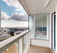 The balcony of a 2-room apartment on Landererova Street in Bratislava with a view of the city.