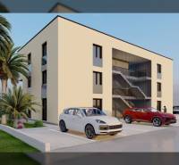 A modern building with palm trees and parking for two cars on Nin Street in the city of Nin.