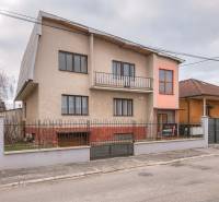 Family house on Kpt. Jaroša Street, Trenčín, with a fenced garden and a balcony.