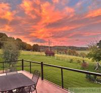 A family house in Lukovištia with a terrace and a view of the picturesque sunset.