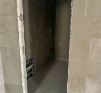 Construction space with entrance to a small room in a 3-room apartment.