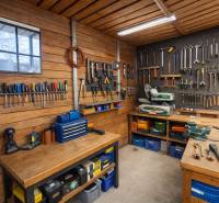 A workshop full of tools in a family house with tables and storage spaces.