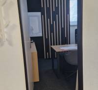 Design wall and office furniture in an office with interesting decor.