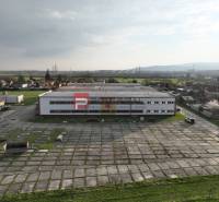 Production premises on Pezinská Street in Vinosady with a large paved area.