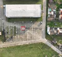 Aerial view of the production facilities on Pezinská Street in Vinosady with adjacent lands.