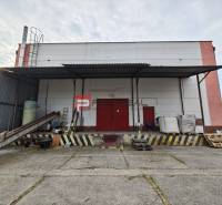 Production premises on Pezinská Street in Vinosady with an outdoor loading area.