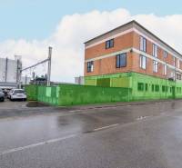 The building on Nádražná Street in Šenkvice, serving as warehouses and halls.