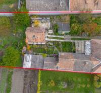 Aerial view of a family house and garden in Veľké Dvorníky.