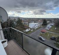 View of the street and Gyurkyho in Šahy from a 4-room apartment with parking.