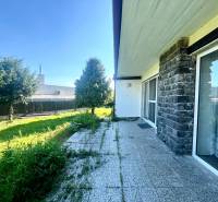 A family house in Ivanka pri Dunaji with a terrace and a garden full of greenery.