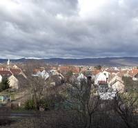 Panorama of rooftops and mountains with a cloudy sky in Bratislava - Vajnory, Tomanova.