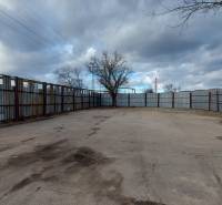 Fenced plot with a concrete surface in Košice, Juh district, for commercial use.