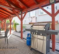Gazebo in Dunajská Streda with a grill and garden furniture, gravel bed.