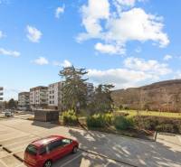 Parking lot and residential buildings on Skalická Road in Bratislava - Nové Mesto.