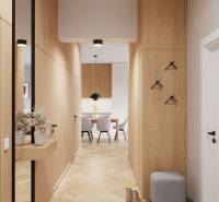 A hallway in a 4-room apartment with a wooden decor floor, leading to the dining room.