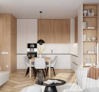 A kitchen with a table and a sofa in a 4-room apartment with a wooden decor floor.