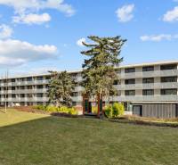 Apartment building with four floors, surrounded by a lawn, Bratislava - Nové Mesto, Skalická cesta.