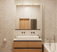 A bathroom in a 4-room apartment with a wooden decor cabinet and a bathtub.