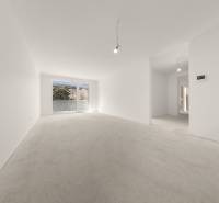 A spacious room in a 4-room apartment with large windows and bare walls.