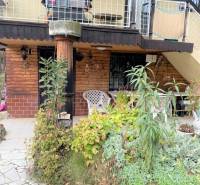 A cottage in the Košice - Vyšné Opátske district with a garden and terrace.
