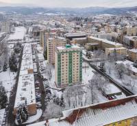 Winter panorama of Banská Bystrica from Trieda SNP with a view of the apartment buildings.