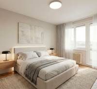 A bedroom in a 2-room apartment with a large bed and a floor with a wood decor.