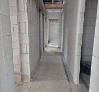 Concrete walls of the structure in the interior of a family house with building material.