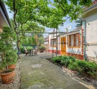 A family house on a quiet street in Trnava with a terrace and greenery.