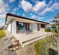 A family house on Jabloňová Street in Bernolákovo with a garden and a paved terrace.