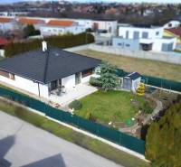 A family house on Jabloňová Street in Bernolákovo with a landscaped garden and a gazebo.