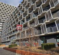 A building with modern architectural design on Račianska Street in Bratislava III, ideal for a 2-room apartment.