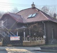 A family house on Rudlovská Road in Banská Bystrica with a dark facade.