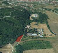 Aerial view of land - housing in Krupina with surrounding nature.