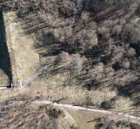 Aerial view of meadows and forests around Krupina suitable for plots - housing.