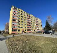 Apartment building on Matice Slovenskej Street in Prešov with parked cars in front of the building.