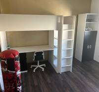 Children's room with a bunk bed, desk, and wardrobe in a 3-room apartment.