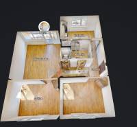 3-room apartment with wood-patterned flooring, kitchen, and loggia.