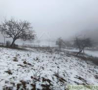 A snowy winter landscape in the Gardens near Nová Baňa with a misty atmosphere.