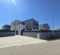 Villa on Zukve Street in Vrsi with a large driveway and a simple facade.