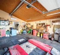 A garage in a family house with tools, equipment, and high-quality gear for work activities.