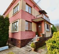 A family house on Kalinčiakova Street in Michalovce with a staircase and a garden.