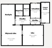 Floor plan of a family house in Pruské with a kitchen, living room, and other spaces.